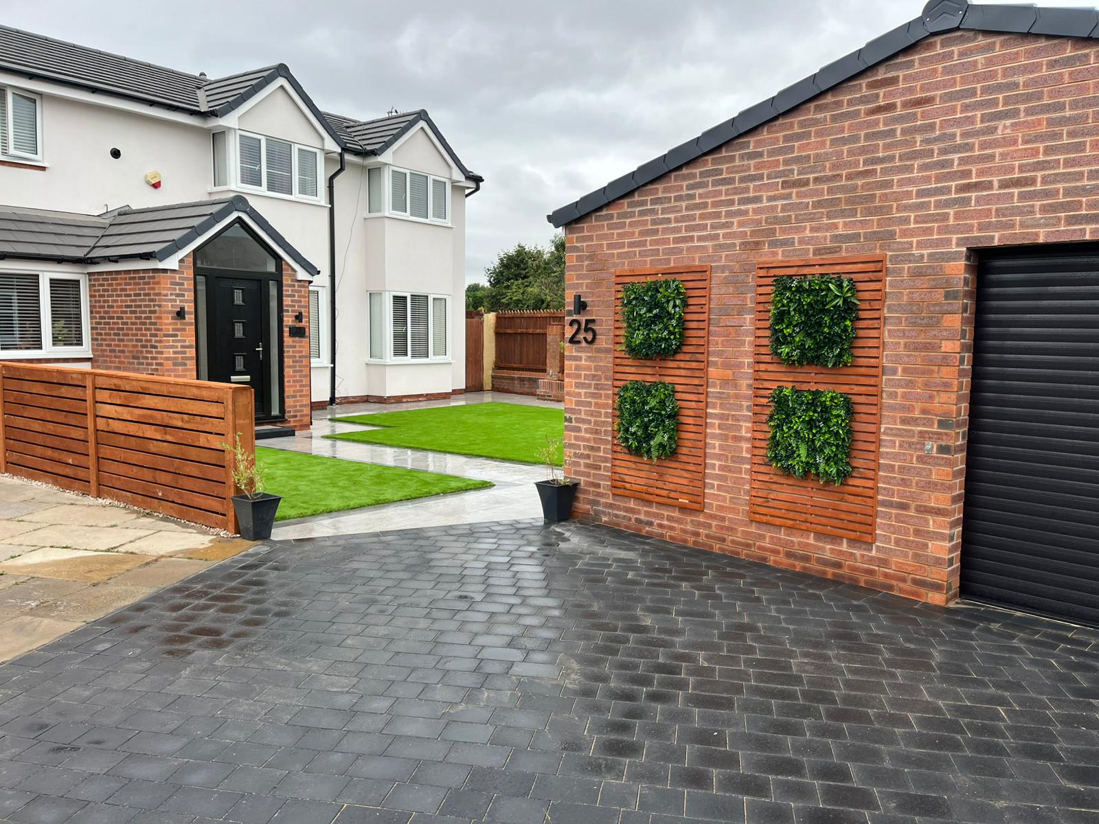 Driveway with new slatted screening to the garage elevation